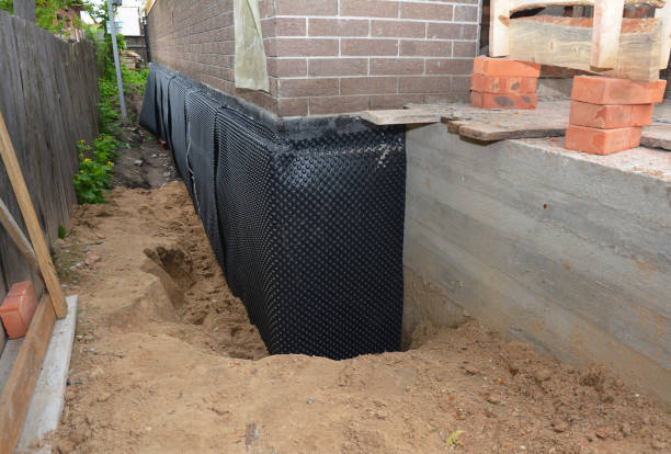 Happy homeowners after waterproofing job in Mount Holly